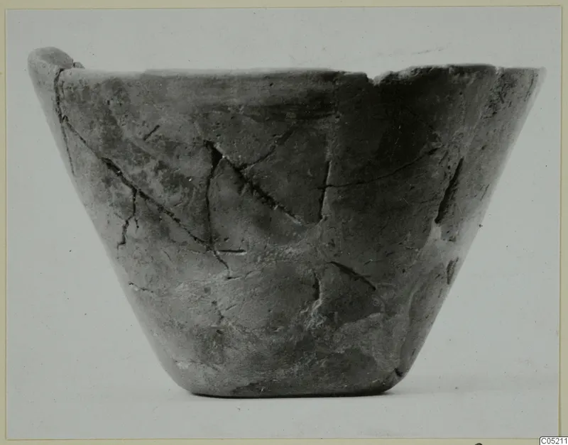 Stone Age pottery bowl from Kythrea, seen from the side against a pale background
