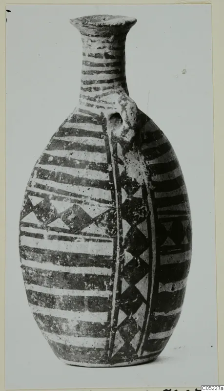 White Painted III-2 pottery bottle with horizontal bands and triangle patterns, photographed on a plain background