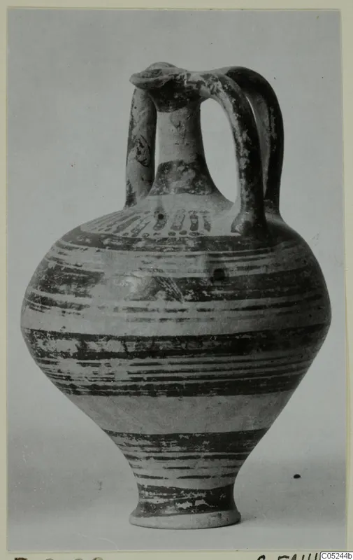Pottery jug in Levanto-Helladic Ware with two loop handles and horizontal bands of dark paint on a pale body.