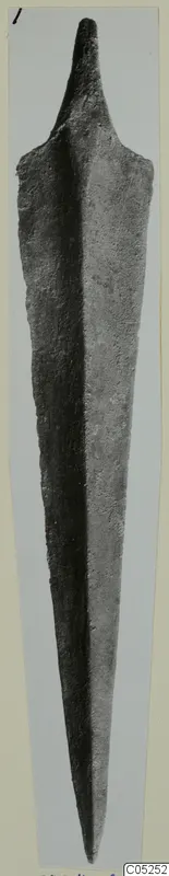 Long metal blade with a tapering point and short tang, from Lapithos