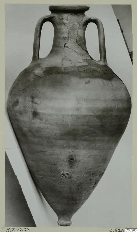 Two-handled pottery vessel with a pointed base and cracked, repaired neck, from Kountoura Trachonia