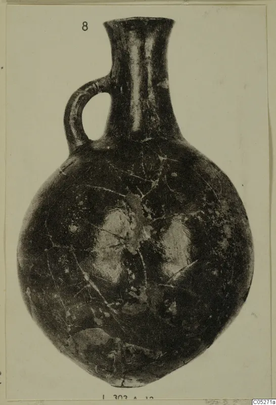 Red Polished III pottery jug with a single loop handle and flared neck