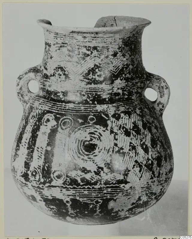 Two-handled painted pottery amphora with a flared rim, photographed from the front against a plain background