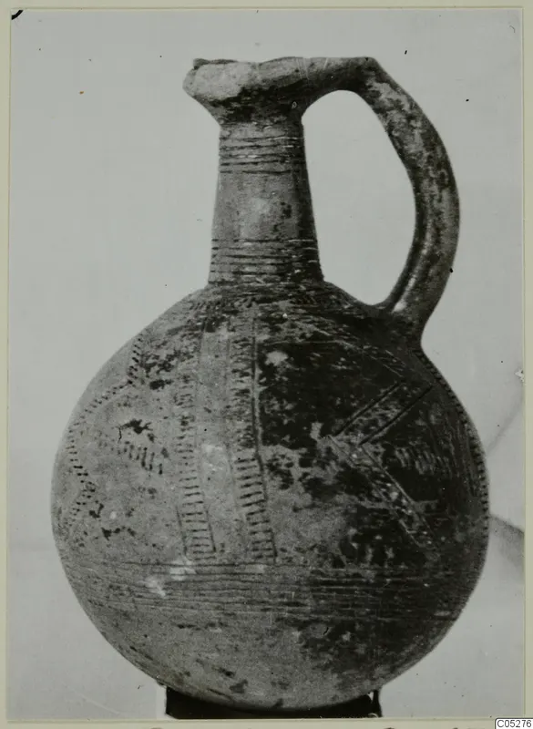 Red Polished II jug with incised bands and a strap handle, from Lapithos, Vrysi tou Barba tombs