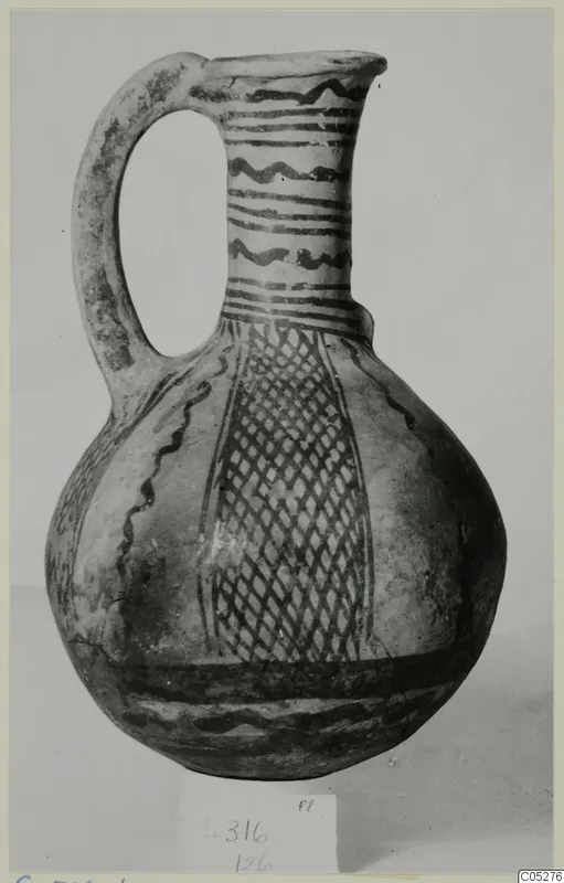 White Painted III-2 jug from Lapithos, with a loop handle, banded neck and lattice-patterned body