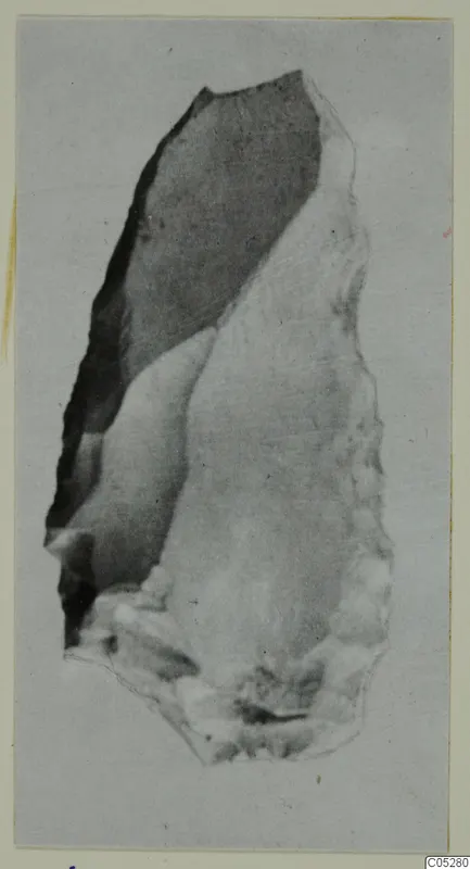 Elongated worked stone object from Kythrea, tapering towards the upper end.
