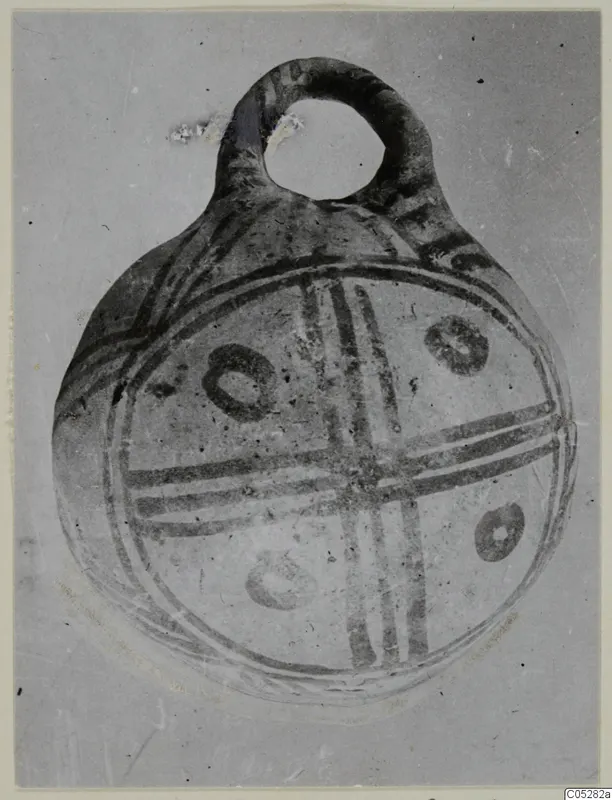 White Painted III-2 pottery vessel from Lapithos, with a loop handle and cross-banded painted decoration