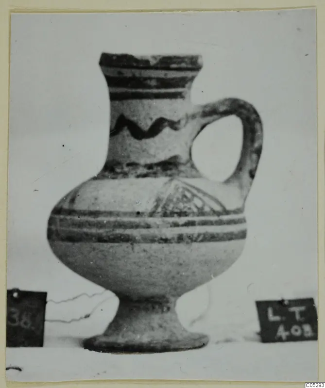 White Painted II jug with a loop handle and dark painted bands, from Lapithos