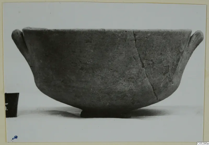 Pottery bowl with two small handles and a low foot, from Lapithos, Kastros tombs.