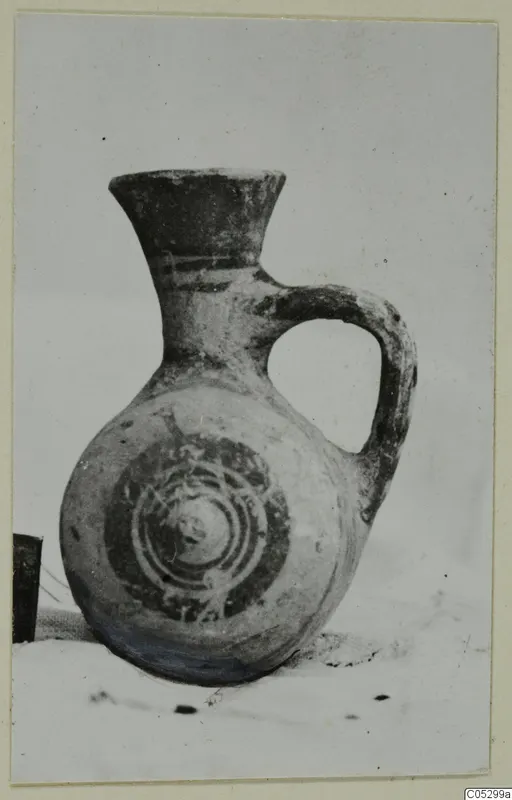 Pottery Bichrome III jug from Lapithos, Kastros tombs, with concentric painted circles on its body