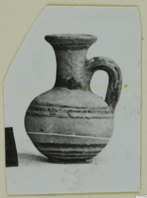 Pottery White Painted II jug from the Kastros tombs at Lapithos, shown in a photograph