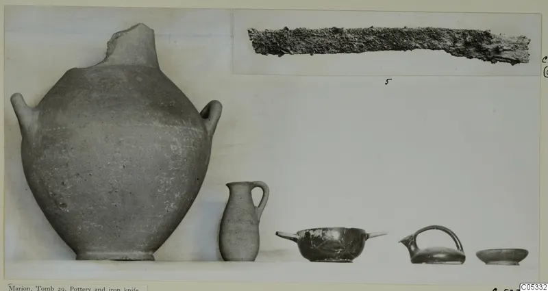 Pottery vessels and an iron knife from Marion, Tomb 29, photographed together