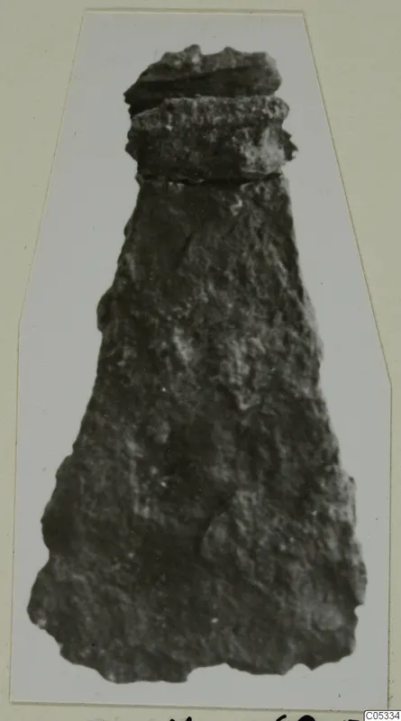 Corroded iron tool from Marion Tomb 36, photographed on a mounted card.