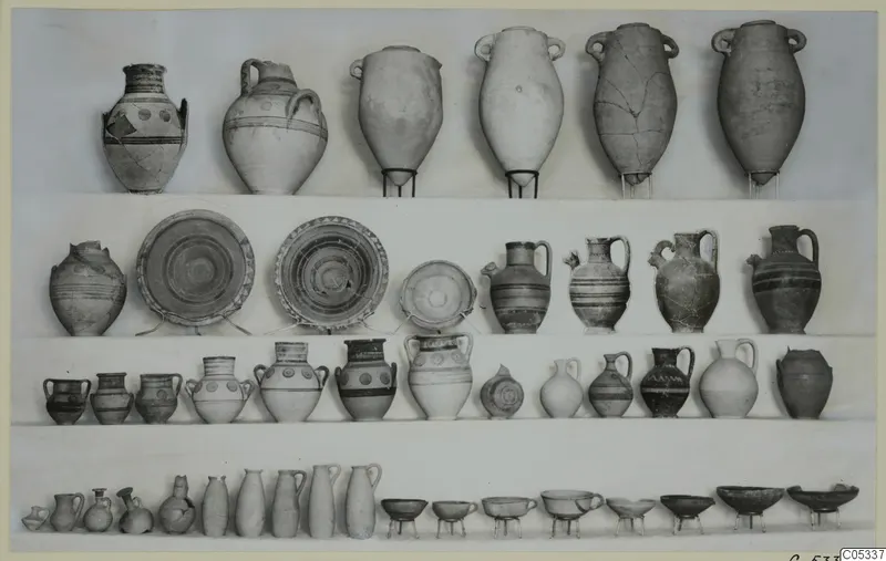Pottery from Tomb 62 at Marion, with vessels arranged in rows