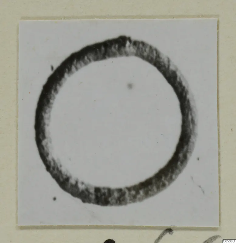 Ring-shaped piece of jewellery from Amathus, shown on a white card against a cream backing