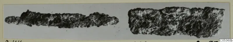 Two corroded iron objects, one possibly a knife blade, from Amathus