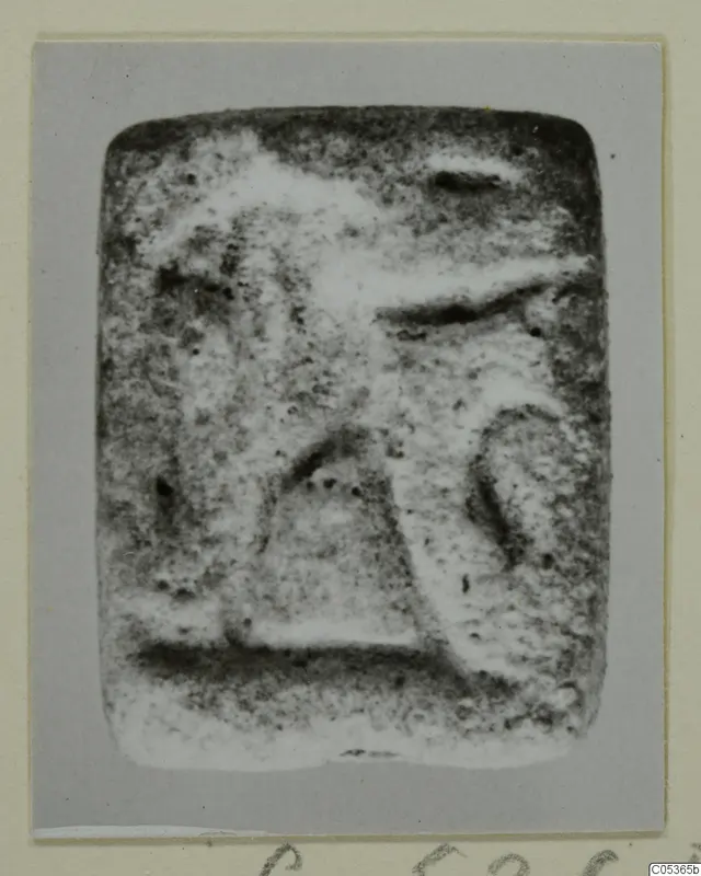 Rectangular stone seal from Amathus, its face carrying raised, worn relief shapes