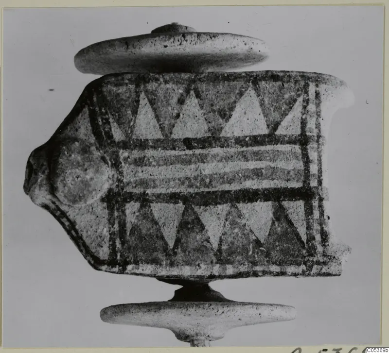 Painted object from Amathus with triangle and band decoration, photographed against a plain grey background