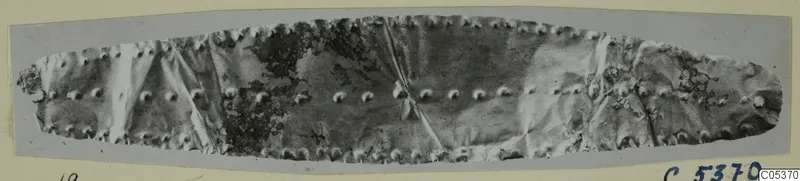 Long, narrow find from Amathus with two rows of small round studs running along its length