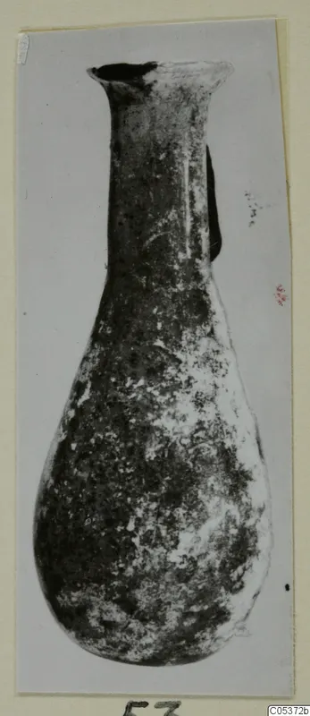 Blown glass vessel from Amathus with a long narrow neck, flared rim and rounded teardrop body