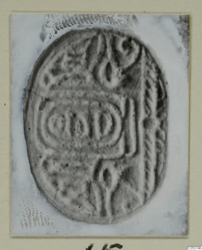Oval engraved seal from Amathus, photographed on a pale card mount