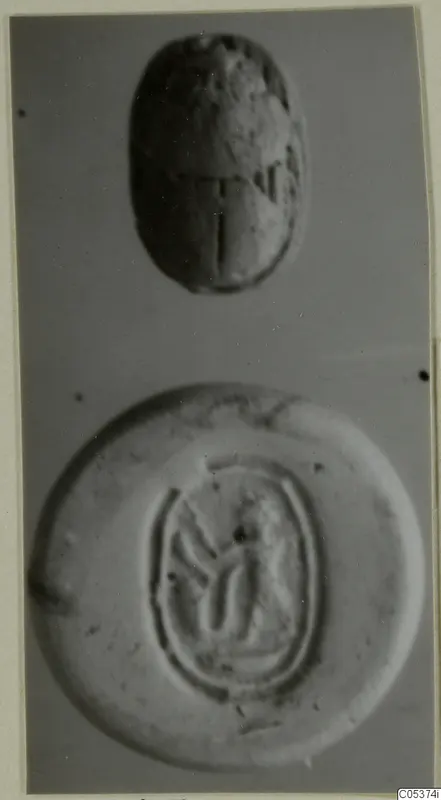 Scarab-shaped seal in two views: the domed back and the flat base with an oval-framed design.