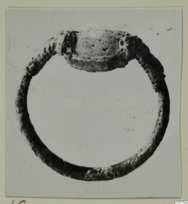 Corroded metal ring with a broad oval bezel, find from Amathus