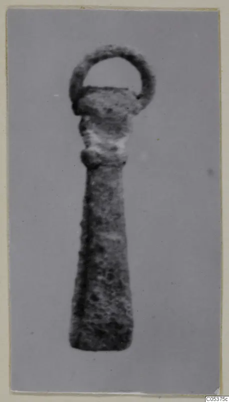 Bronze toilet requisite with a loop at one end, from Amathus