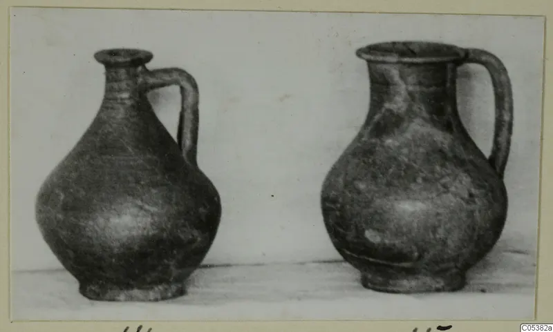 Two single-handled jugs from Amathus finds, photographed side by side
