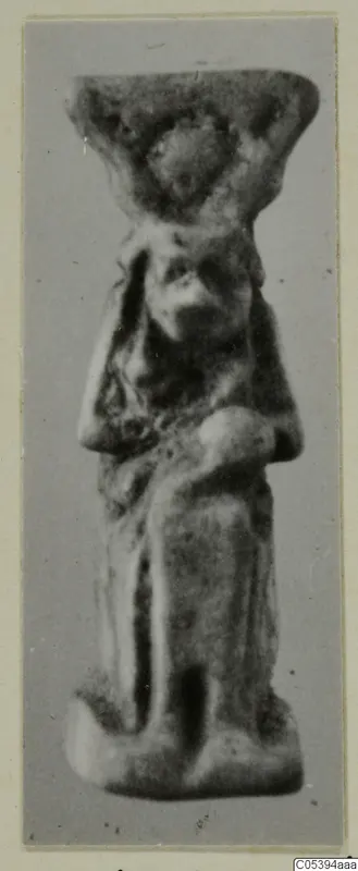 Small standing figure with a broad flat-topped headdress, labelled Hator, from Marion Tomb 50