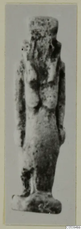 Small standing figure, faience amulet, from Marion Tomb 50