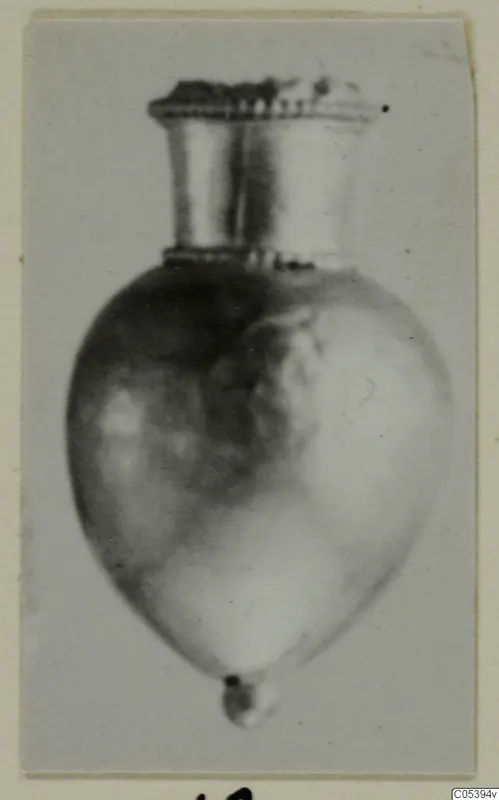 Teardrop-shaped vessel with a tall flared neck and ridged rim, from Marion, Tomb 56
