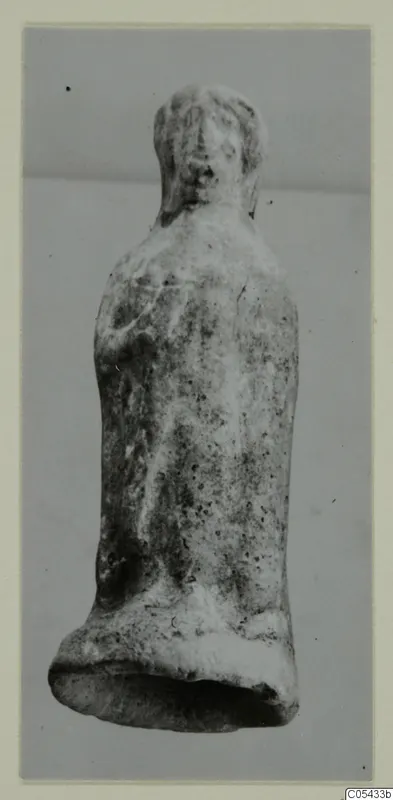 Small terracotta figurine of a standing figure from tomb finds at Marion