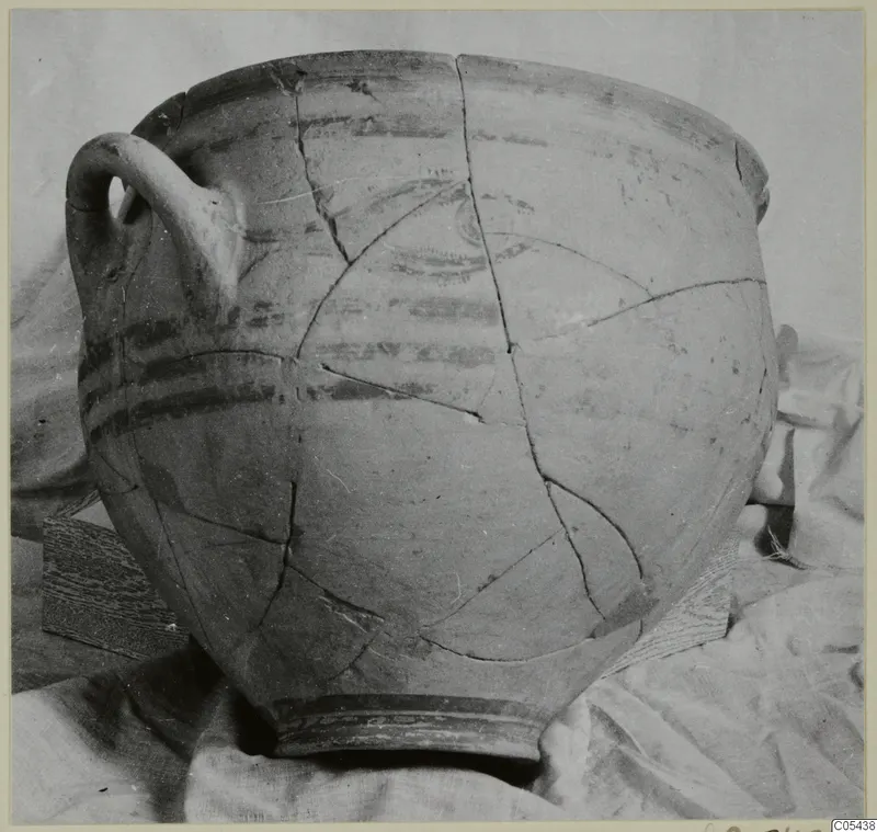 Levanto-Helladic amphora-crater, broken and mended, with dark painted horizontal bands on a round body