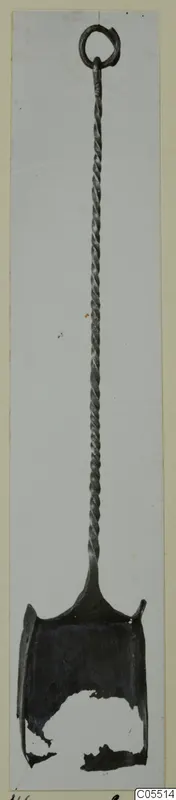 Metal object from Amathus with a long twisted handle, a loop at the top and a broken, bowl-like end at the bottom.