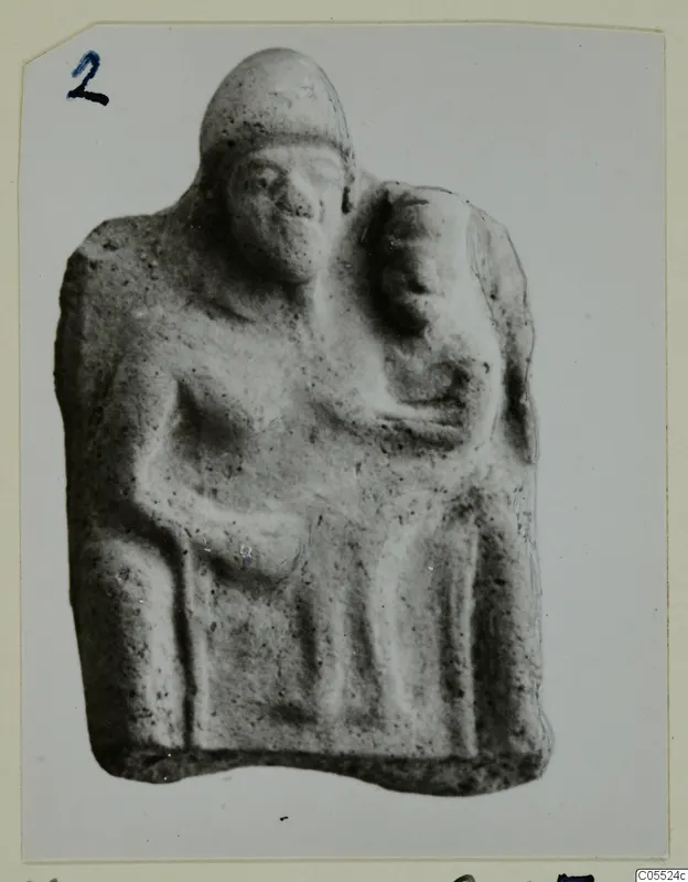 Terracotta figurine of a standing figure with a smaller head beside it, from Mersinaki