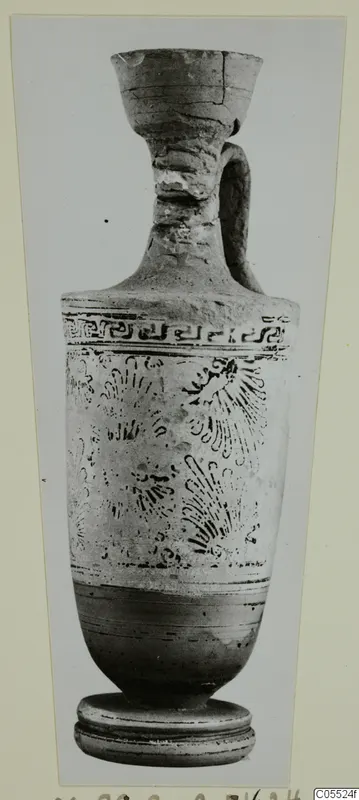 Pottery White Grounded lekythos from Marion, with a single handle and dark painted fan motifs