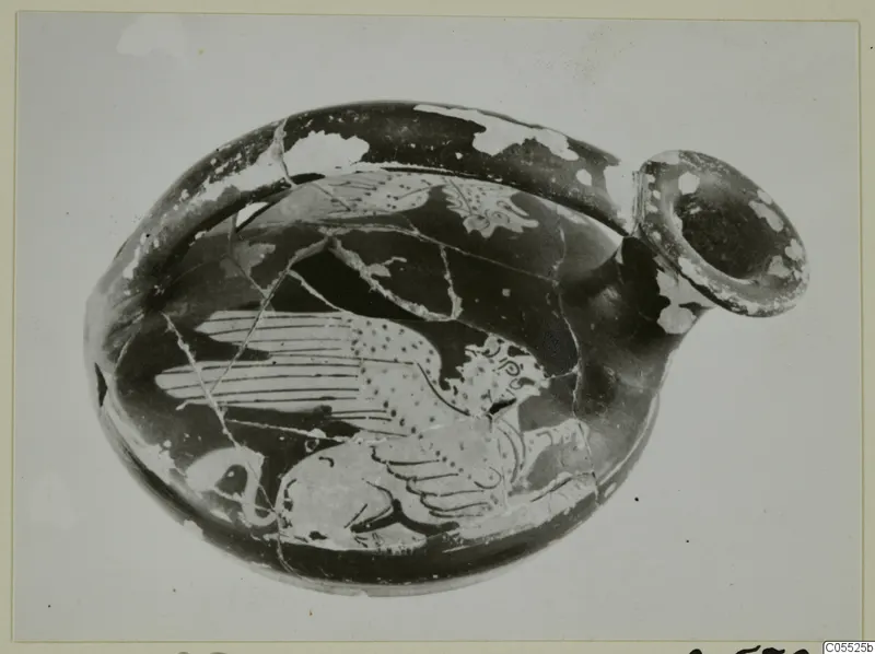 Guttus, a red-figure vessel with a winged animal painted on its rounded body