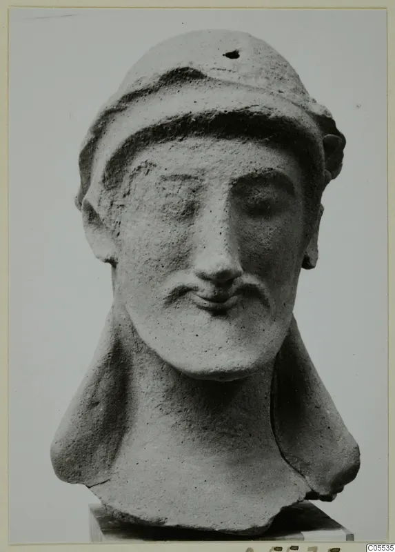 Terracotta head of a bearded man in a close-fitting cap, from Mersinaki