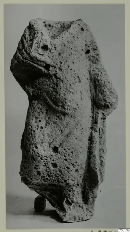 Headless porous stone statue fragment of a standing figure from Mersinaki