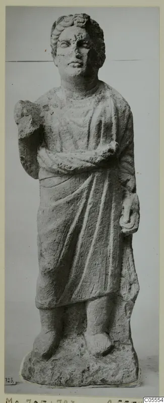 Standing draped stone statue from Mersinaki, shown on a mounted photograph with a number label