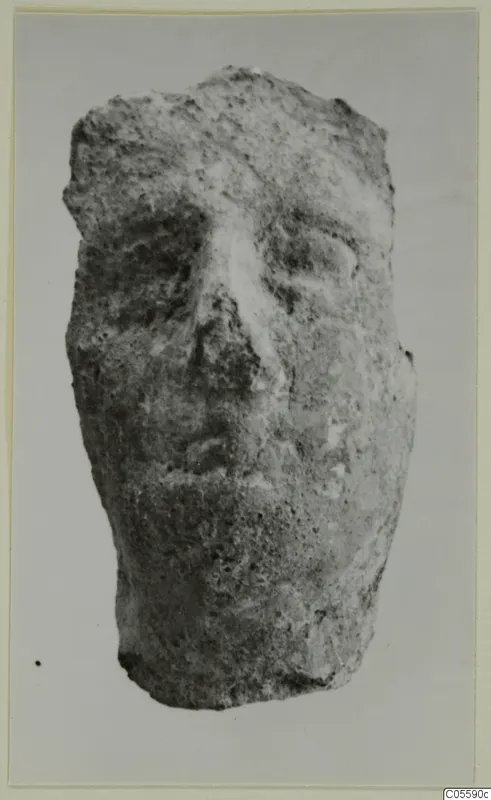 Terracotta fragment of a modelled human face from Mersinaki, shown frontally