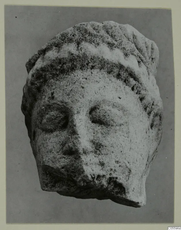 Limestone head fragment from Mersinaki, shown from the front