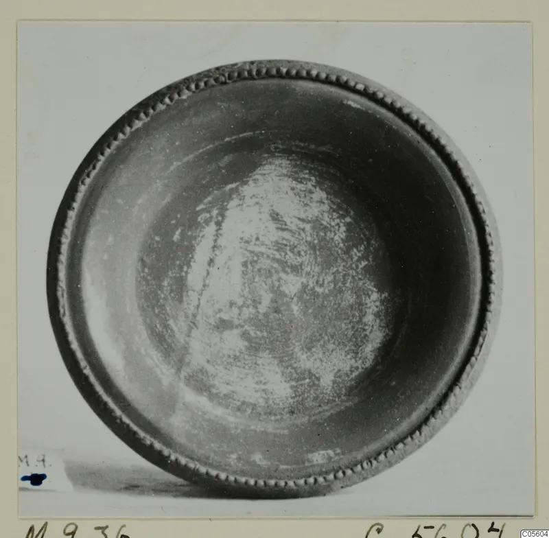 Bowl from Marion seen from above, showing its dark interior and beaded rim