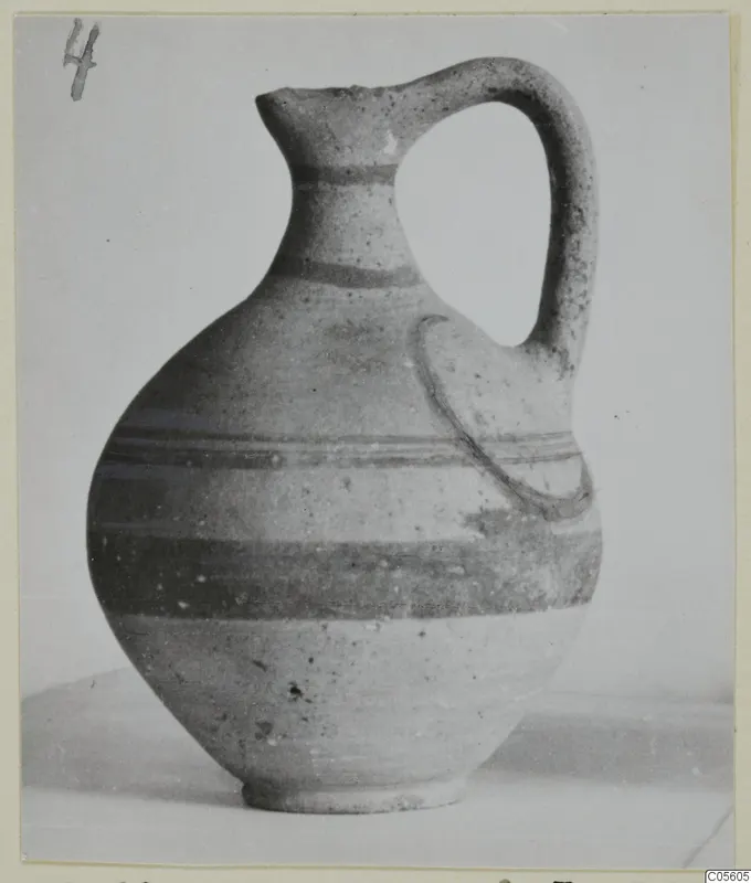 Pottery jug with a single loop handle and dark painted bands, White Painted V