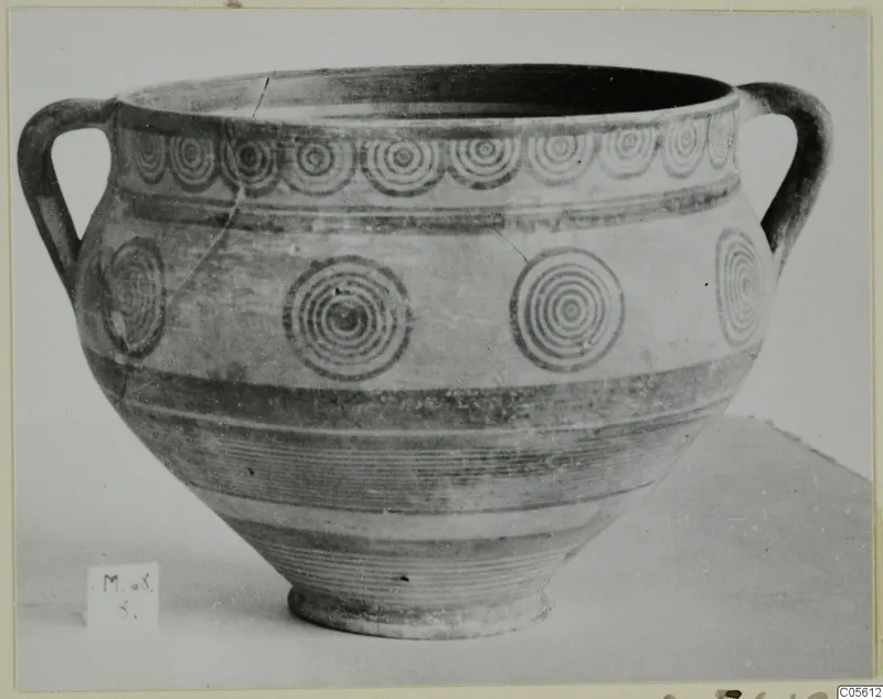 Two-handled bowl with painted concentric circles and horizontal bands