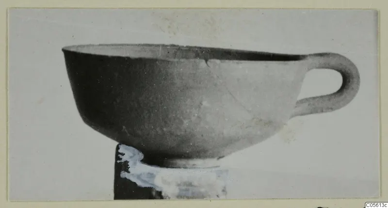 Pottery Plain White IV-V bowl with a single loop handle, from Marion, finds from tombs 61–98