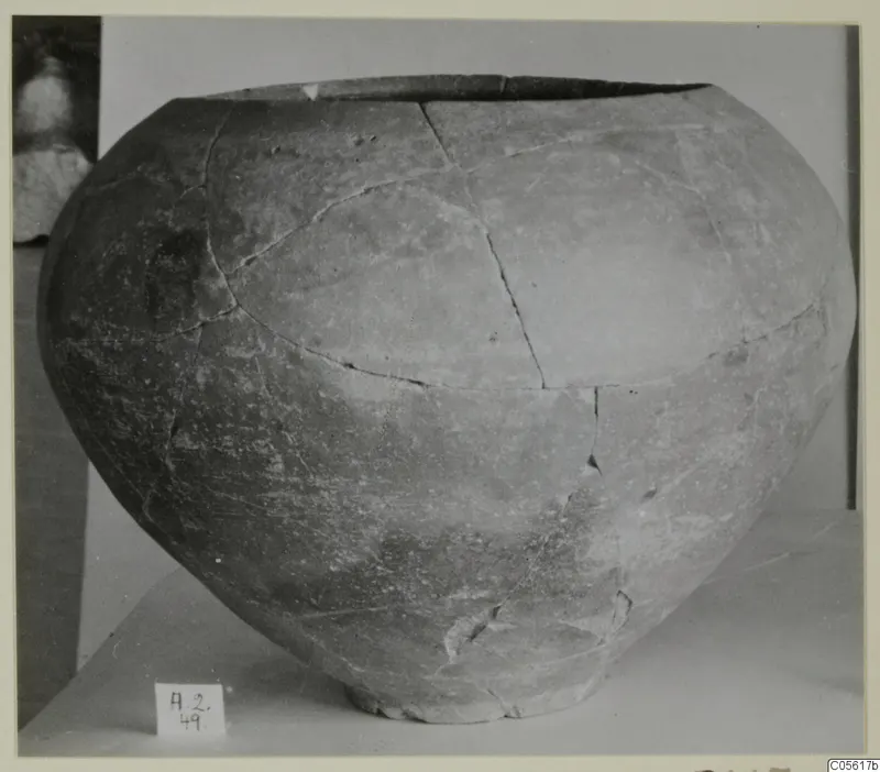 Red Slip pottery vessel from Amathus with a broad, rounded body and a short foot.