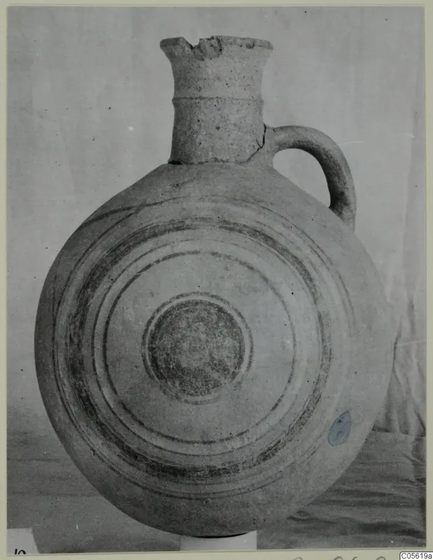 Jug with a tall neck and concentric painted bands on its body, from Amathus