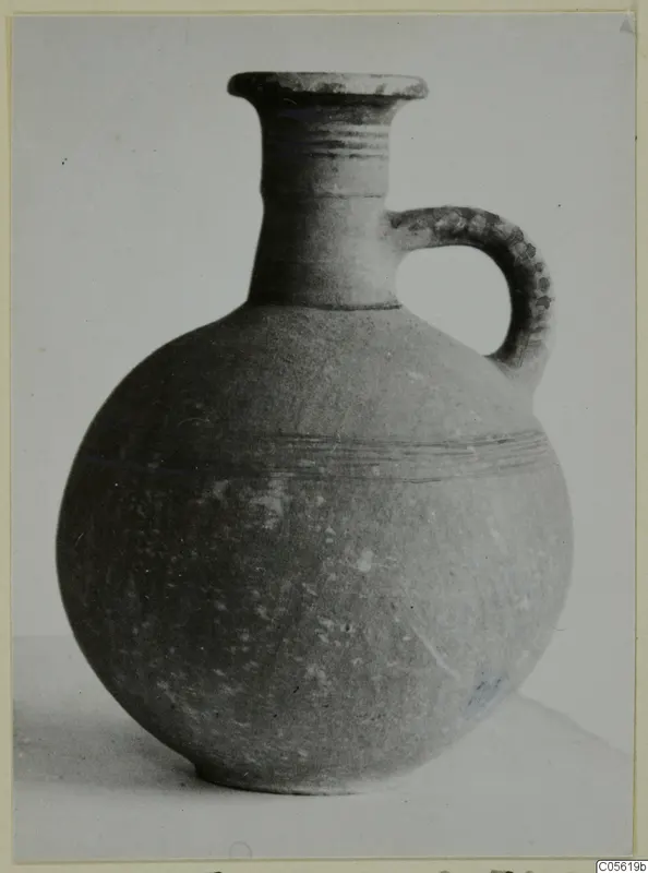 Round-bodied jug with a ridged loop handle and dark banded lines, Pottery Black-on-Red I-III from Amathus